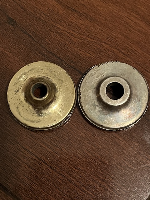 Bottom cap on the left, top cap on the right.